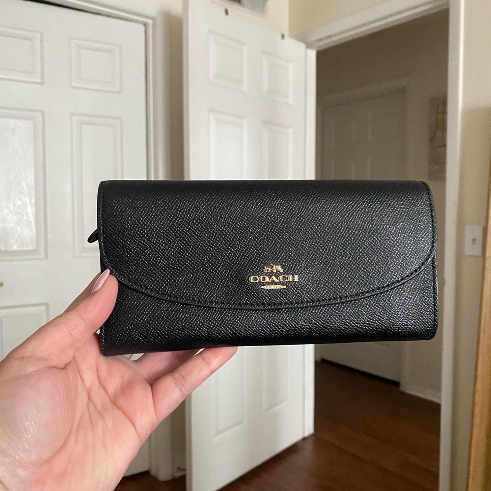Coach leather wallet.